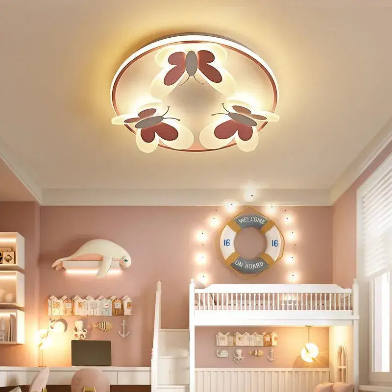 Butterfly pink ceiling light with three illuminated white and maroon butterfly designs and warm metallic border for kids room decorbites butterfly pink