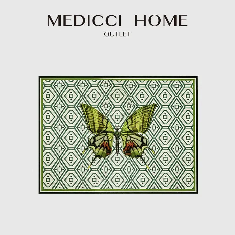 Medici home outlet butterfly print throw pillow featuring a green and black butterfly on an off-white geometric decorbites butterfly print background