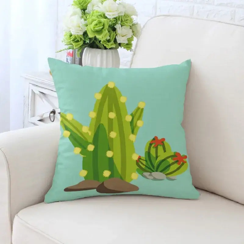Teal decorative pillowcase featuring decorbites cactus hand painting with green cacti and a red blooming flower for living room decor