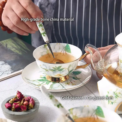 Elegant white bone china tea set featuring gold-painted camellia floral design by decorbites for refined dining
