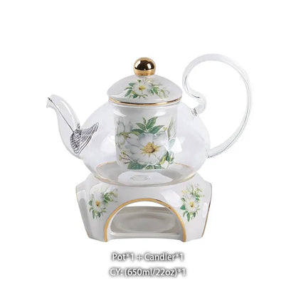 Clear glass Camellia floral tea set with white and gold porcelain teapot and matching ceramic candle warmer base