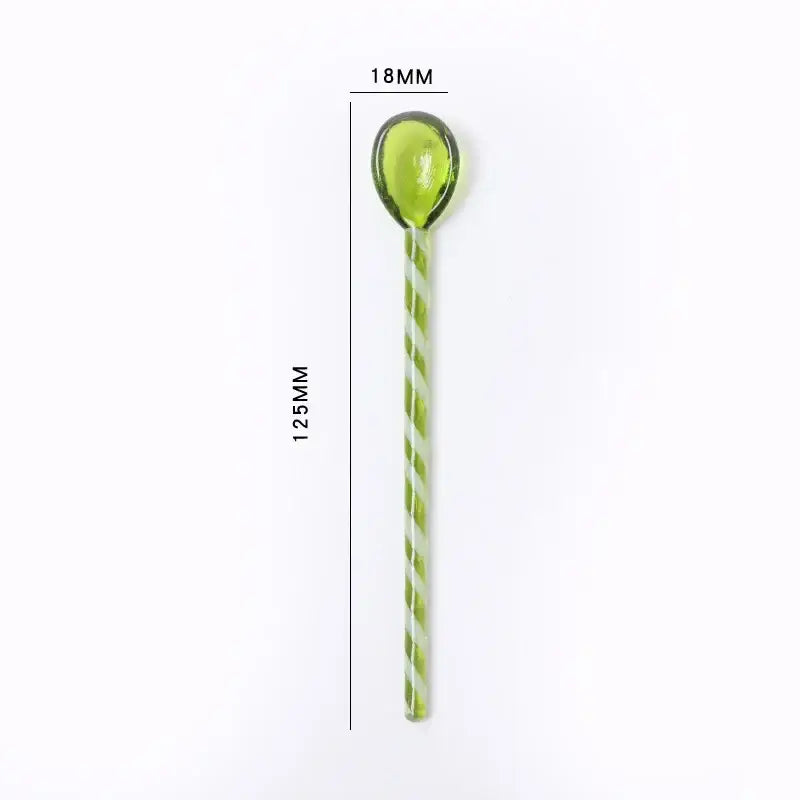 Translucent lime green glass stirring spoon with twisted handle from decorbites colorful glass stirring set for kitchen decor