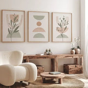 Three framed decorbites™ abstract line leaf geometry canvas wall art with muted earth tones in light wood frames simple abstract wall