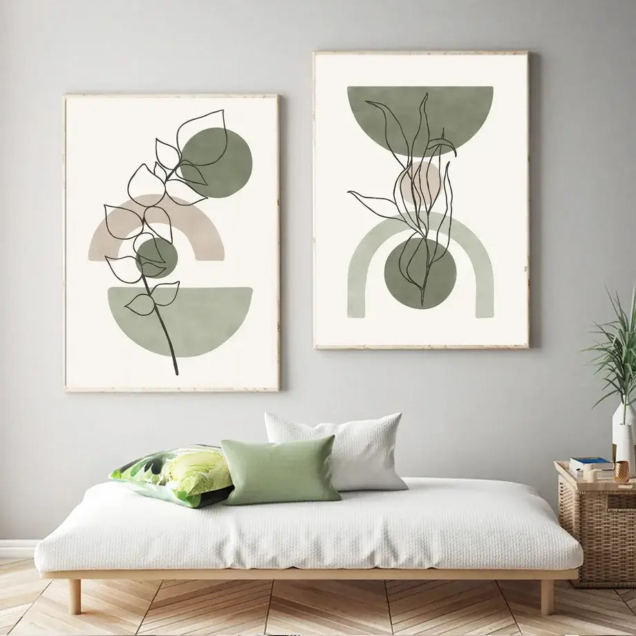 Two framed decorbites™ vintage boho canvas wall art prints featuring abstract geometric leaves in muted sage green and beige