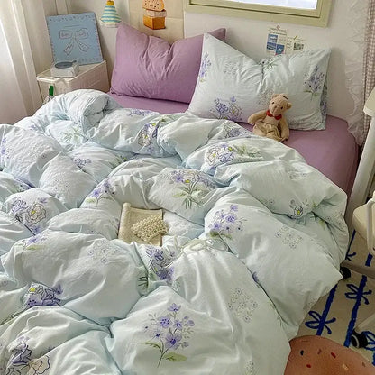 Light blue floral embroidered quilt cover set with soft textured fabric for bedroom bedding use