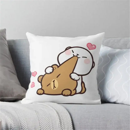 White throw pillow with decorbites cartoon animal printed design featuring two characters and pink hearts animal printed pillowcase