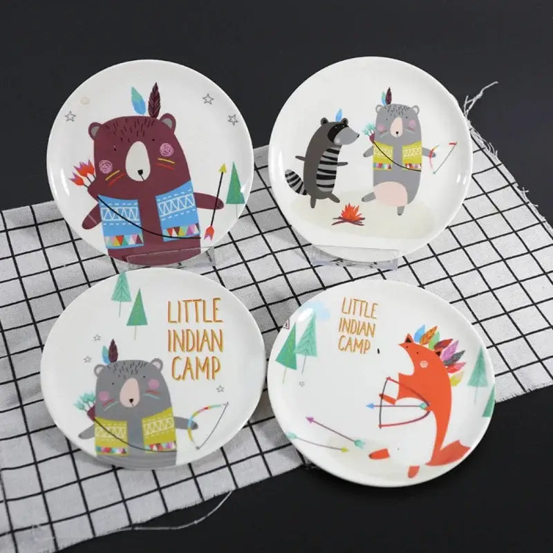 Set of four white ceramic bone snack plates with colorful cartoon animals and tribal patterns for dining room decorbites bone snack