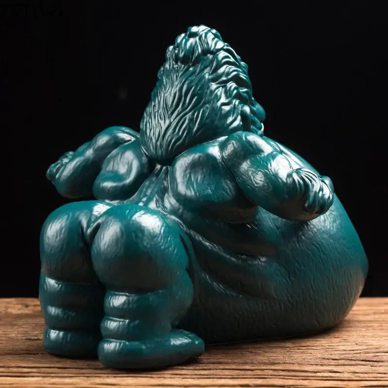 Teal glossy resin gorilla ceramic ashtray with detailed fur and musculature for living room decorbites gorilla ceramic