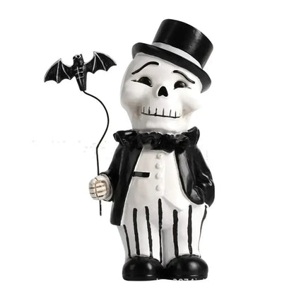 Cartoon black and white skeleton gentleman bat figurine in tuxedo with top hat holding bat string for living room decor