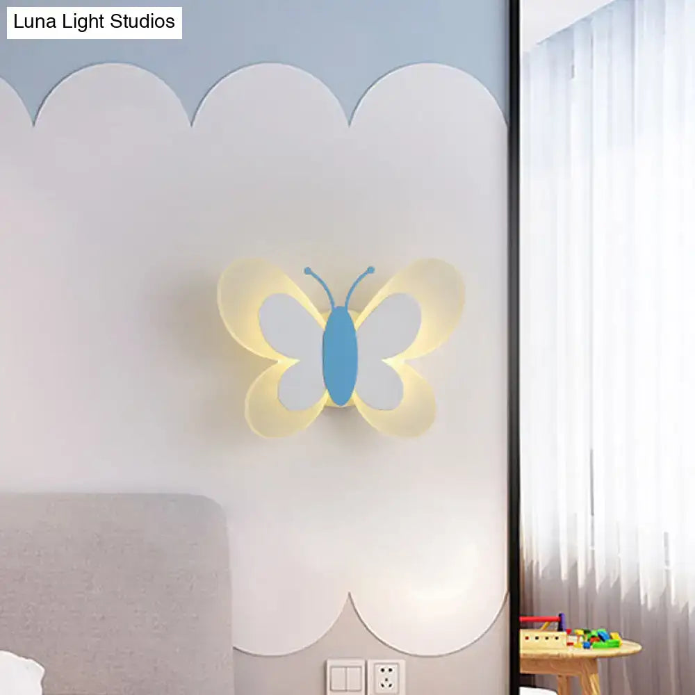 Cartoon blue and gray butterfly led wall light with translucent yellow wings and blue body for kindergarten decor