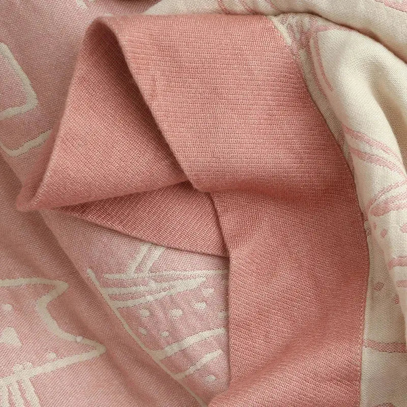 A soft pink linen fabric with subtle white geometric pattern for decorbites cartoon cat bamboo cotton throw blanket cream decor