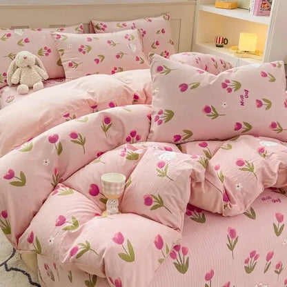 Pink cotton duvet set with cartoon cat floral design featuring soft plush fabric and pink tulip pattern with green stems