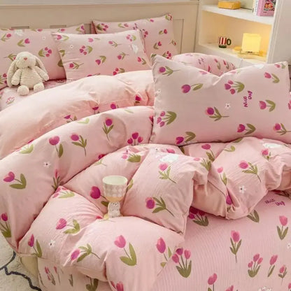 Pink cotton duvet set with cartoon cat floral design and tulip leaf patterns in soft pastel tones for bedroom bedding