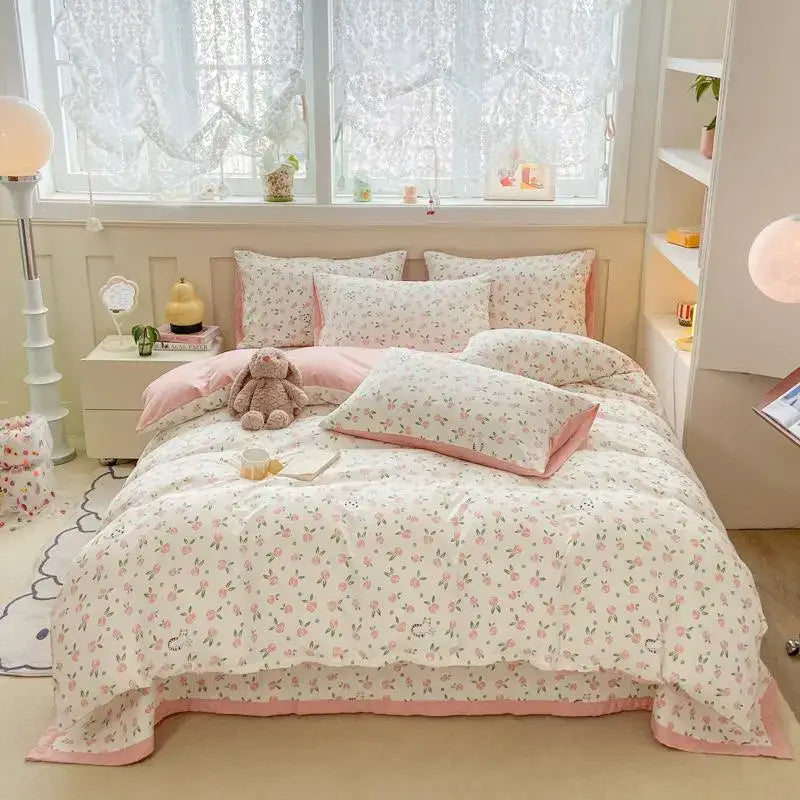Pink and white cotton duvet set with cartoon cat floral pattern and ruffled edges for bedroom bedding