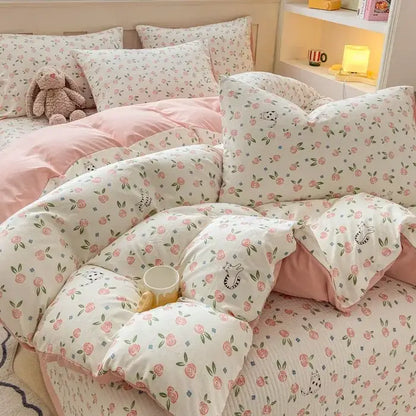 Pink and white cotton duvet set with cartoon cat floral pattern and soft cozy texture for bedroom bedding