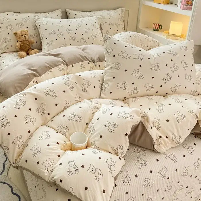 Cream-colored cotton duvet cover set with plush texture featuring black teddy bear silhouettes and small stars