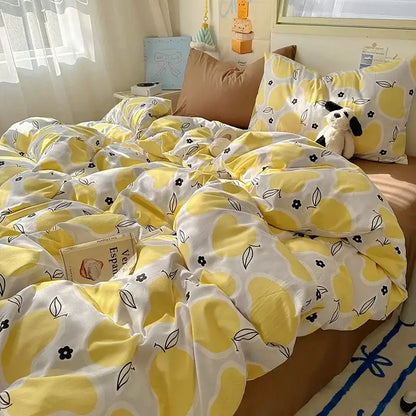 Yellow and white lemon-patterned cotton fitted sheet set with black floral accents for bedroom bedding