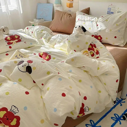 White cotton fitted sheet set with playful cartoon dog and cupcake cream characters and colorful polka dots