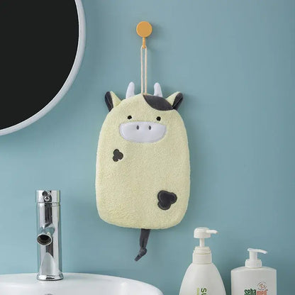 A soft pale yellow cow-shaped hand towel with black spots and ears hanging decorbites cartoon embroidery hanging design