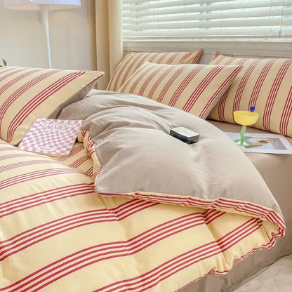 Cream-colored duvet set with bold red vertical stripes made of soft cotton fabric from the cartoon heart floral collection