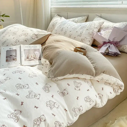 White duvet set with small teddy bears and bows in soft brown ink paired with beige pillowcases for cozy bedroom cartoon heart floral design