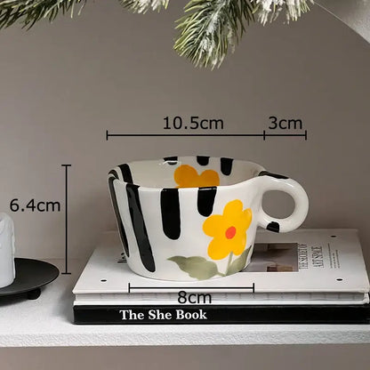 White ceramic mug from decorbites cartoon pattern ceramic mug set with black stripes and yellow flower design