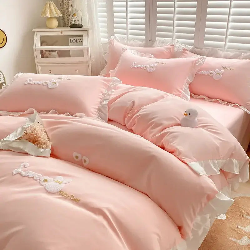 Pink satin bedding set with white ruffled edges and embroidered floral designs for decorbites cartoon princess bedroom