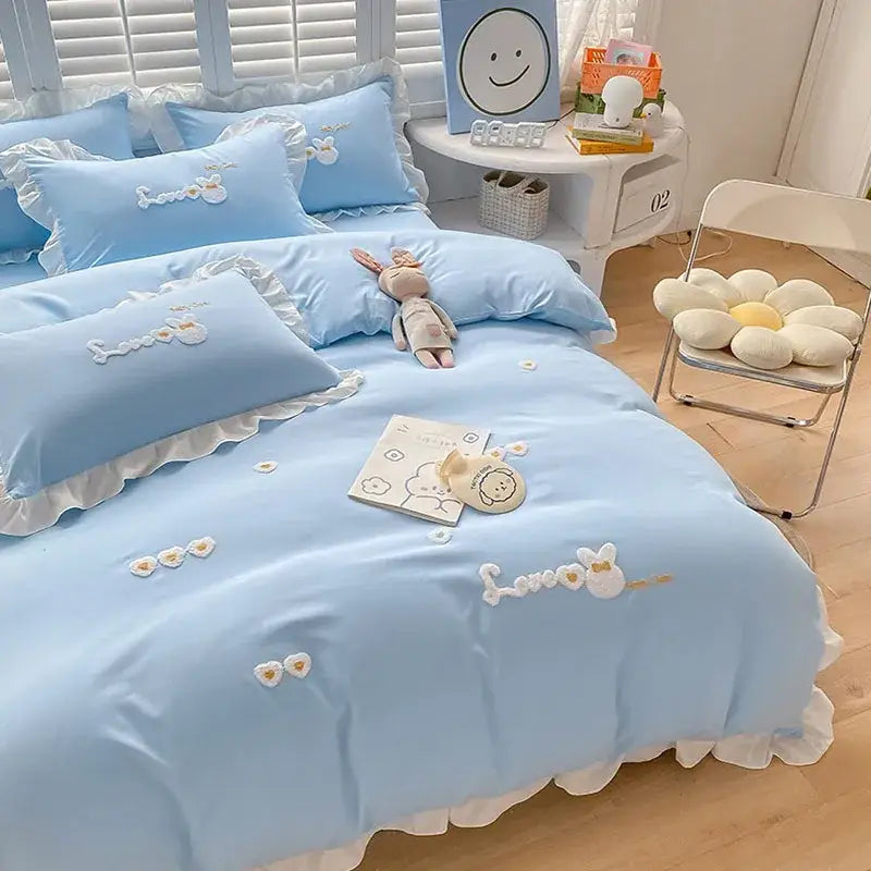 Light blue ruffled bedding set with embroidered bunny and floral appliqués from decorbites cartoon princess collection