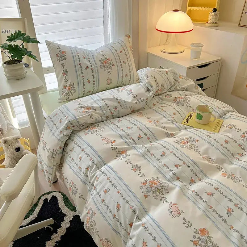 Pastel floral and striped cotton duvet set in cream and blue featuring decorbites cartoon printed bedding for bedroom decor