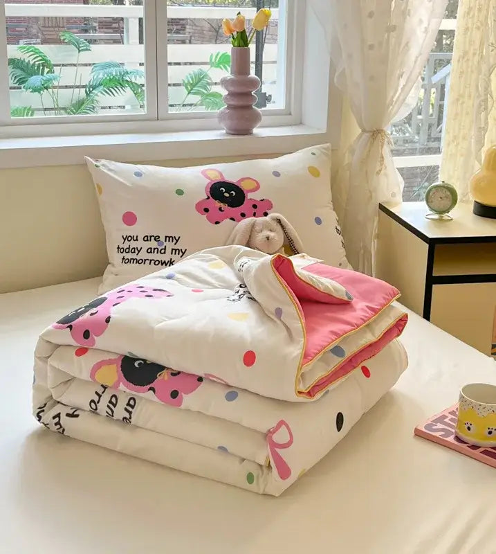A cozy white cooling blanket with pink and black cartoon ladybugs colorful polka dots and soft pink lining decorbites cartoon printed summer quilt