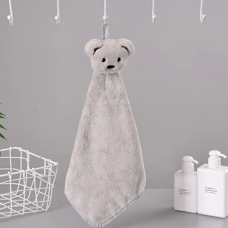 A soft light gray plush cartoon rabbit hand towel made of coral fleece quick dry terry cloth by decorbites cartoon rabbit