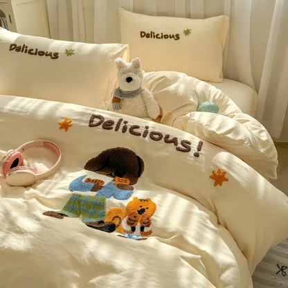 Cream-colored duvet cover with brown delicious lettering and embroidered cartoon characters in decorbites cartoon towel bedding set