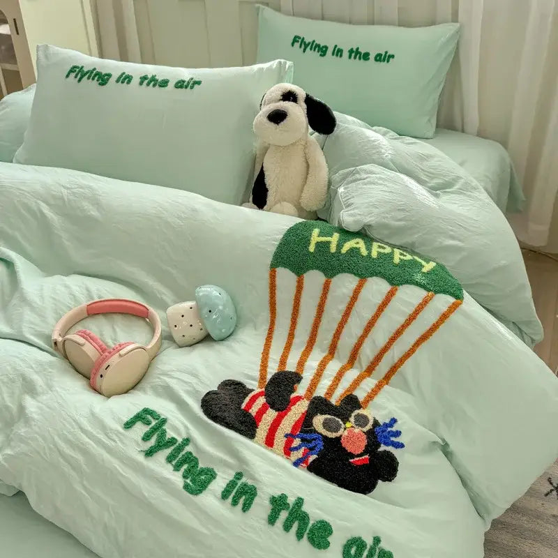 Mint green plush bedding set with decorbites cartoon towel embroidery of parachuting bear and flying in the air text