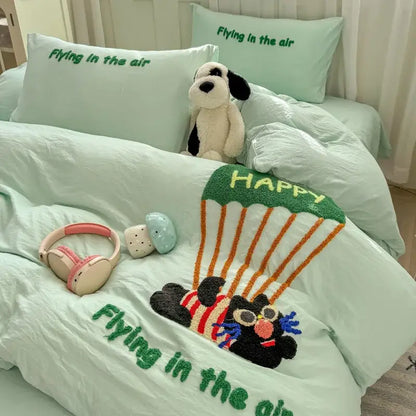 Mint green plush bedding set with decorbites cartoon towel embroidery of parachuting bear and flying in the air text
