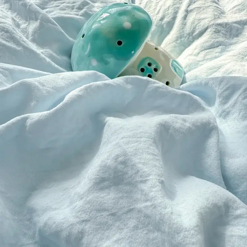 Turquoise ceramic mushroom with white polka dots and black holes as decorbites cartoon towel embroidery bedding set decor