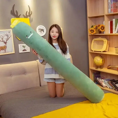 A plush green cucumber-shaped comfort long body pillow with yellow tip and embroidered face for bedroom decorbites comfort long use