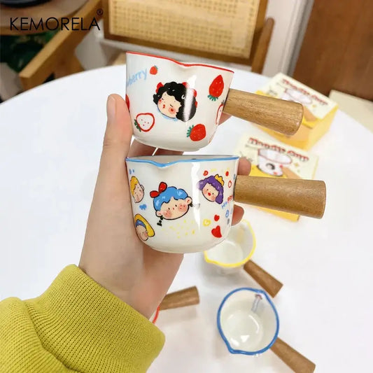 White italian ceramic measuring cups with wooden handles featuring colorful cartoon characters and strawberry motifs decorbites italian ceramic