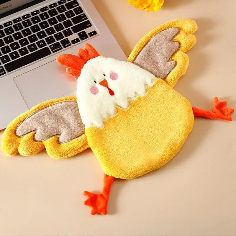 Yellow plush chicken-shaped coral velvet hand towel with white fluffy head and gray wing accents for kitchen decorbites coral velvet decor