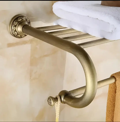 Antique bronze brass bathroom towel rack with carved antique decorbites finish and ornate circular wall mount