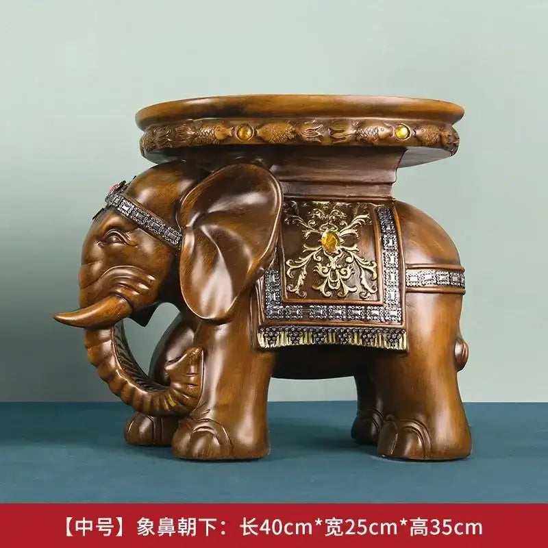 Brown resin elephant wealth attracting ornaments stool with ornate gold silver inlay decorative saddle and headband