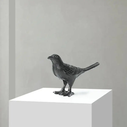 Black matte iron bird decoration with detailed feather texture standing posture for elegant living room display