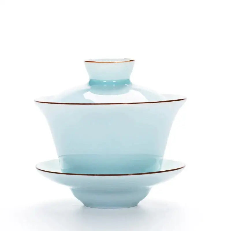Celadon light blue tea set with delicate ceramic gaiwan featuring gold rims for elegant tea tureen dining room use