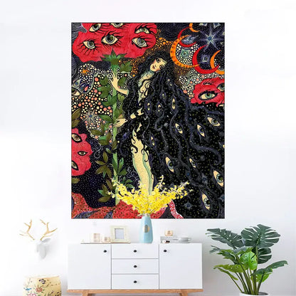 Celestial floral wall hanging featuring a psychedelic tapestry with a central black-haired figure and red floral motifs decorbites celestial floral