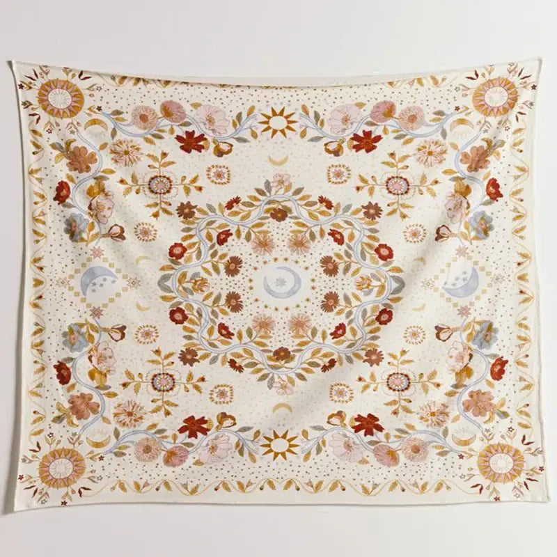 A cream-colored celestical floral moon tapestry with moon phase design featuring flowers suns and vines in earthy tones