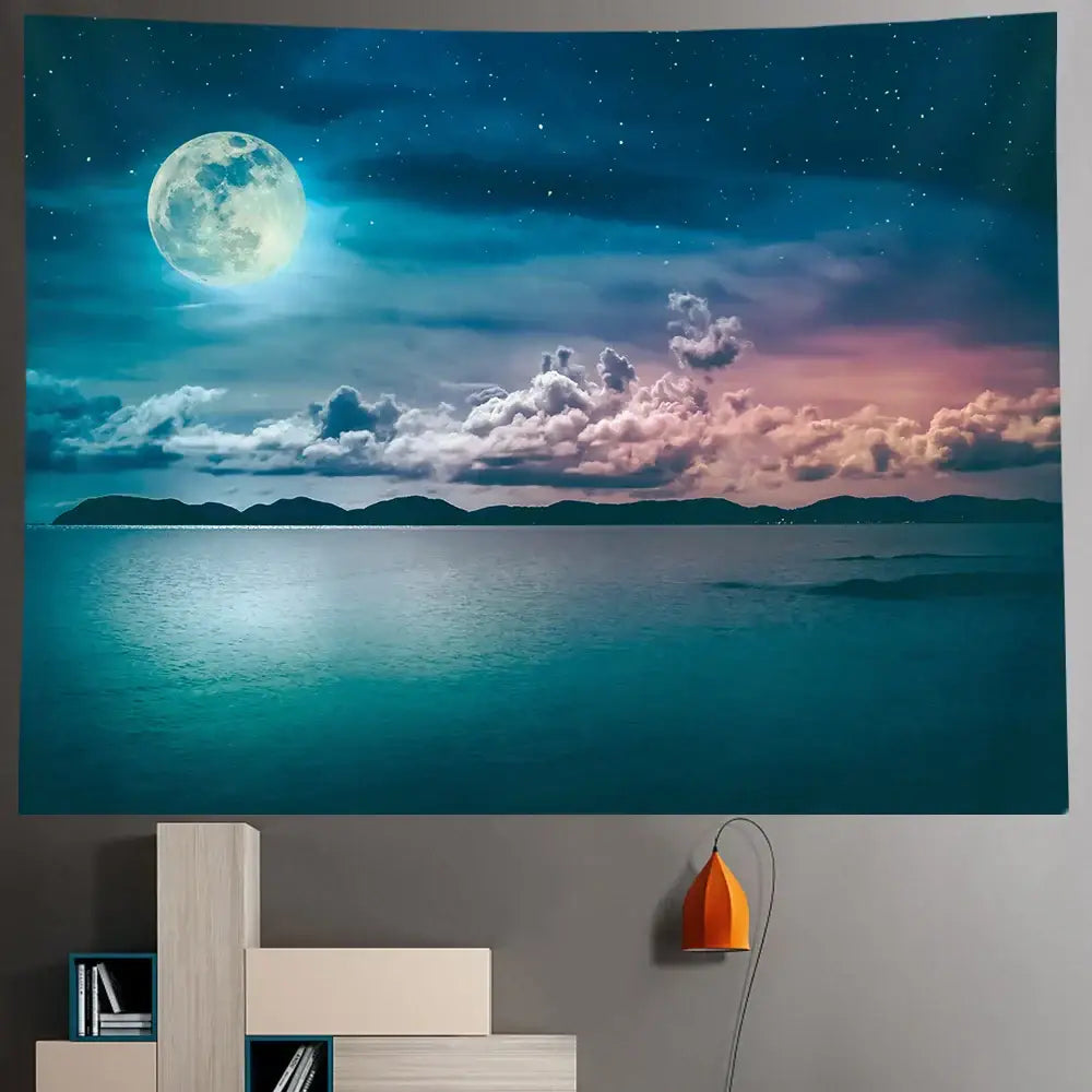 A vibrant celestial moon night sky beach tapestry with luminous full moon and starry horizon in blues and purples