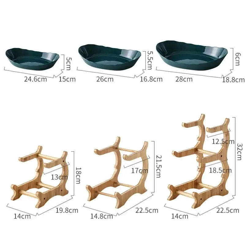 Set of three dark green ceramic table plates with scalloped edges and matching bamboo wine bottle stands