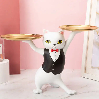 White ceramic cat figurine in black tuxedo with red bow tie holding gold trays for cat figurines storage tray decor