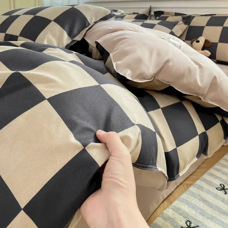Checkerboard black and beige satin duvet cover set with a soft satin-like finish for bedroom bedding