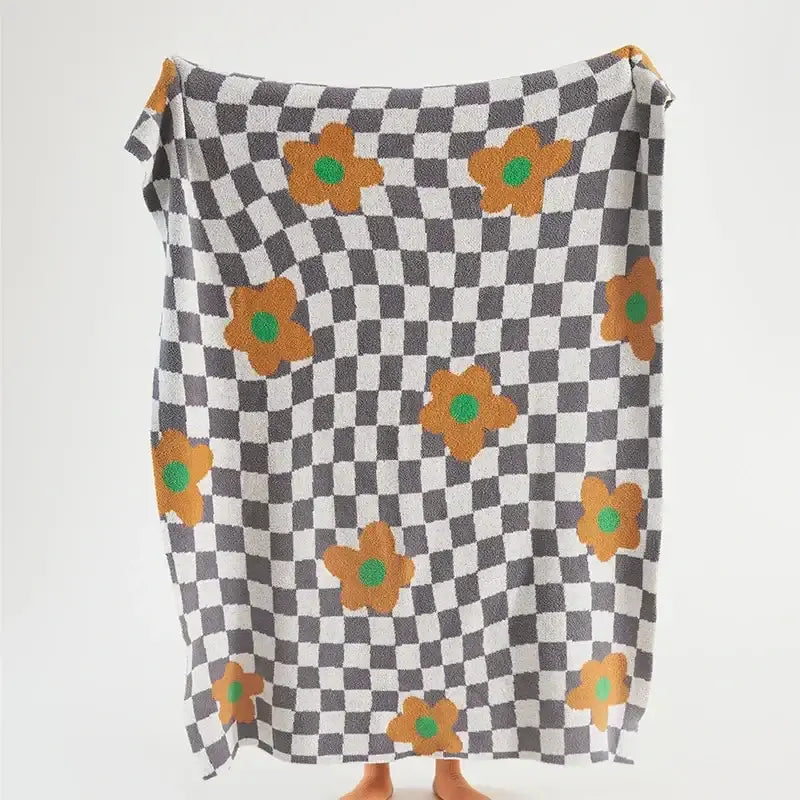 Cozy decorbites knitted blanket throws 130x160cm with black and white checkerboard pattern and orange floral accents