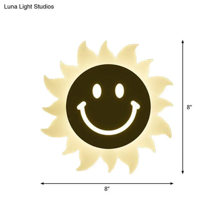 Cheerful white smiling sun led wall sconce bedroom light with illuminated black face and radiating sun rays